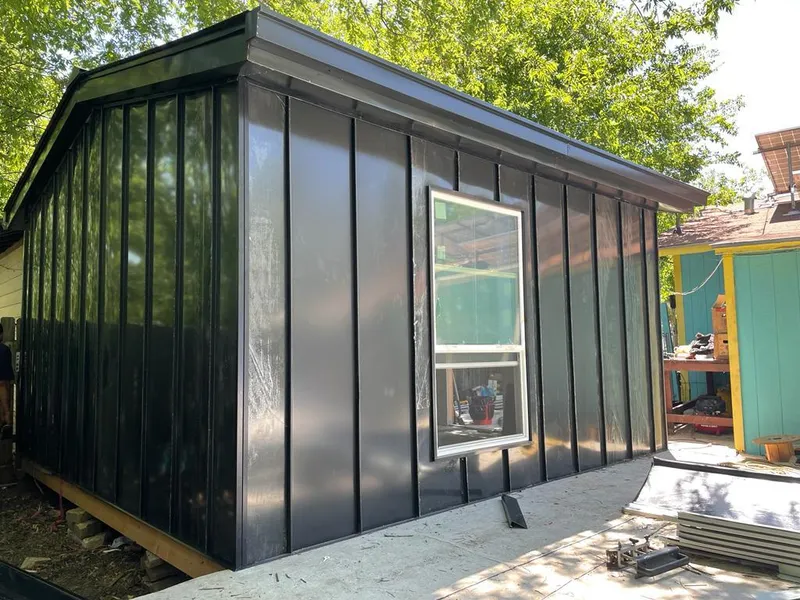 Black standing seam metal wall panels for Roof Inspection in Big Bear City